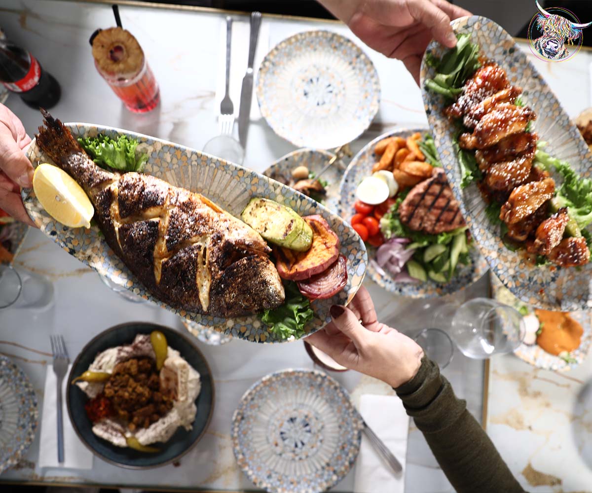 מנת דג מושלם ולצידו מנת כנפיים - הפי דייס חוף הקשתות - יום לגיבוש